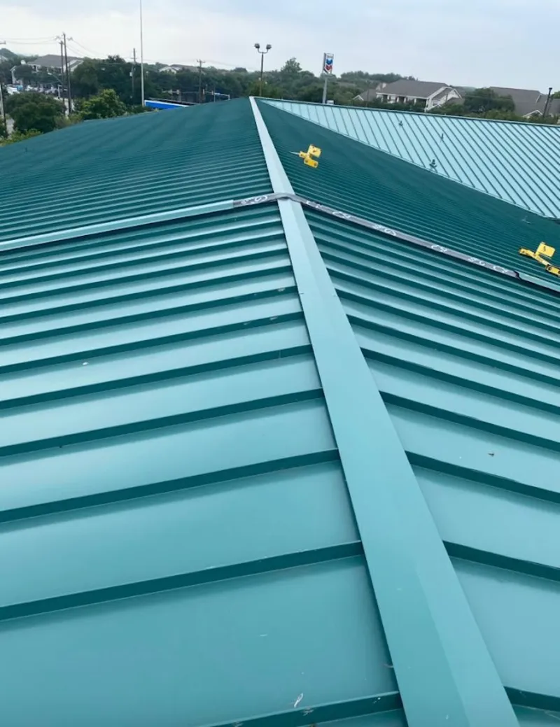 Green commercial metal roof ridge and valley for Metal Roof Repair in Ellsworth