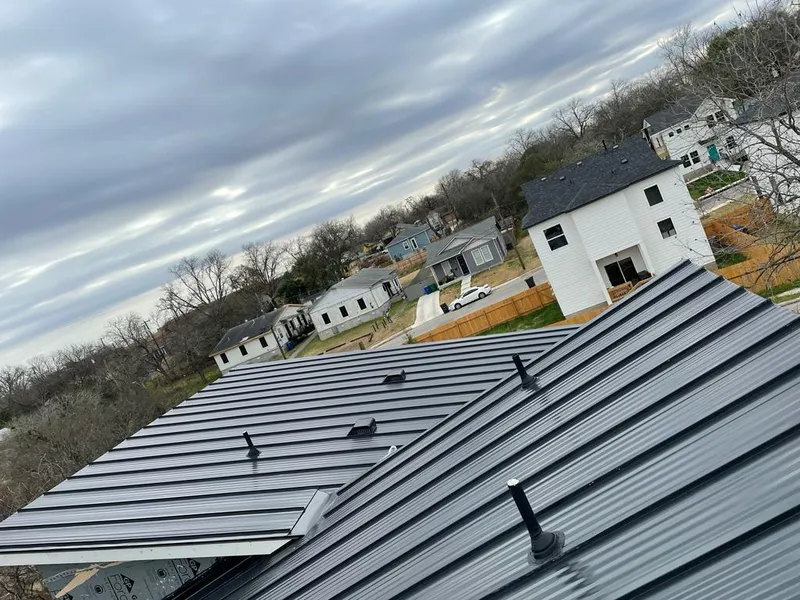 Standing seam metal roof panels with vents for Skylight Repair in Ellsworth